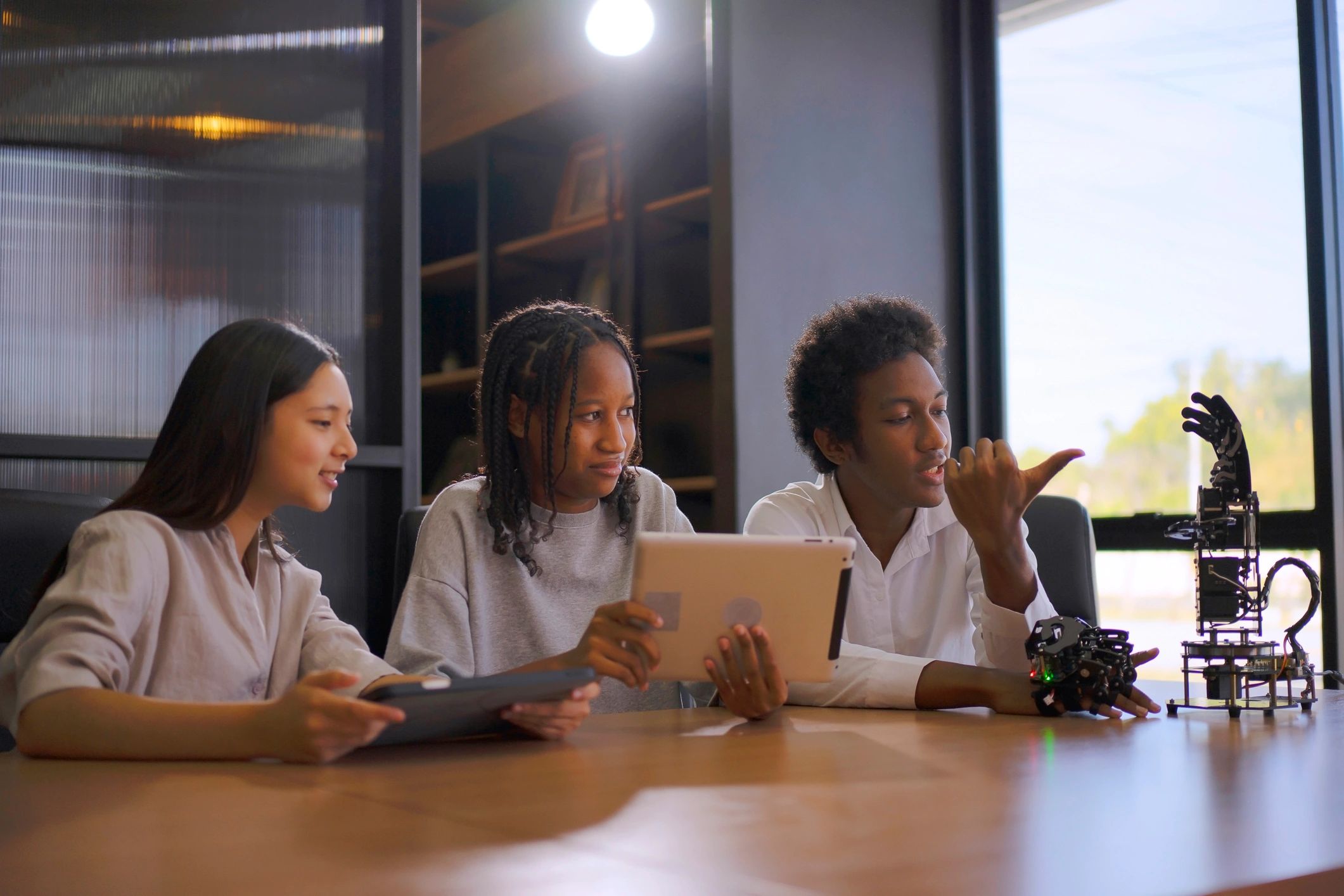 Learners using technology in a practical training environment
